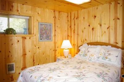 small bedroom in old basement off of Family room