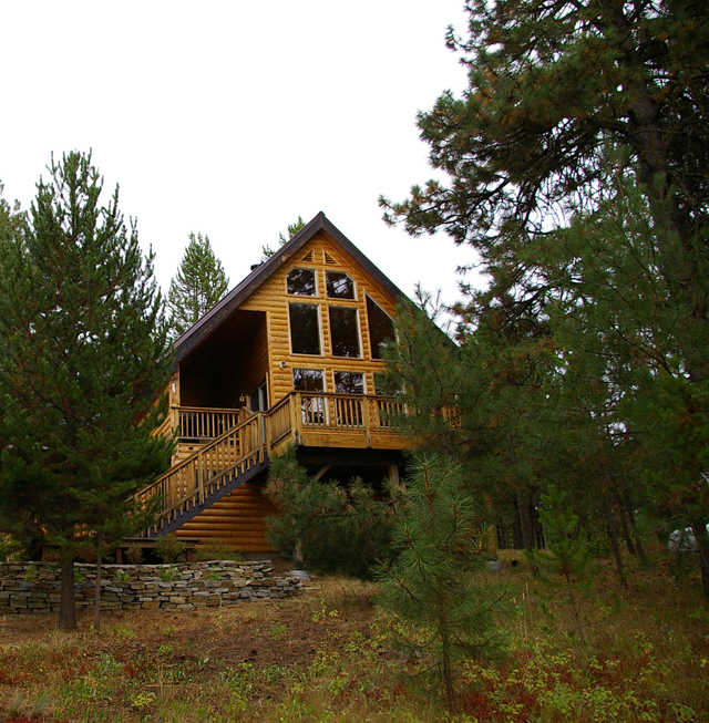 West face of house new addition from pond