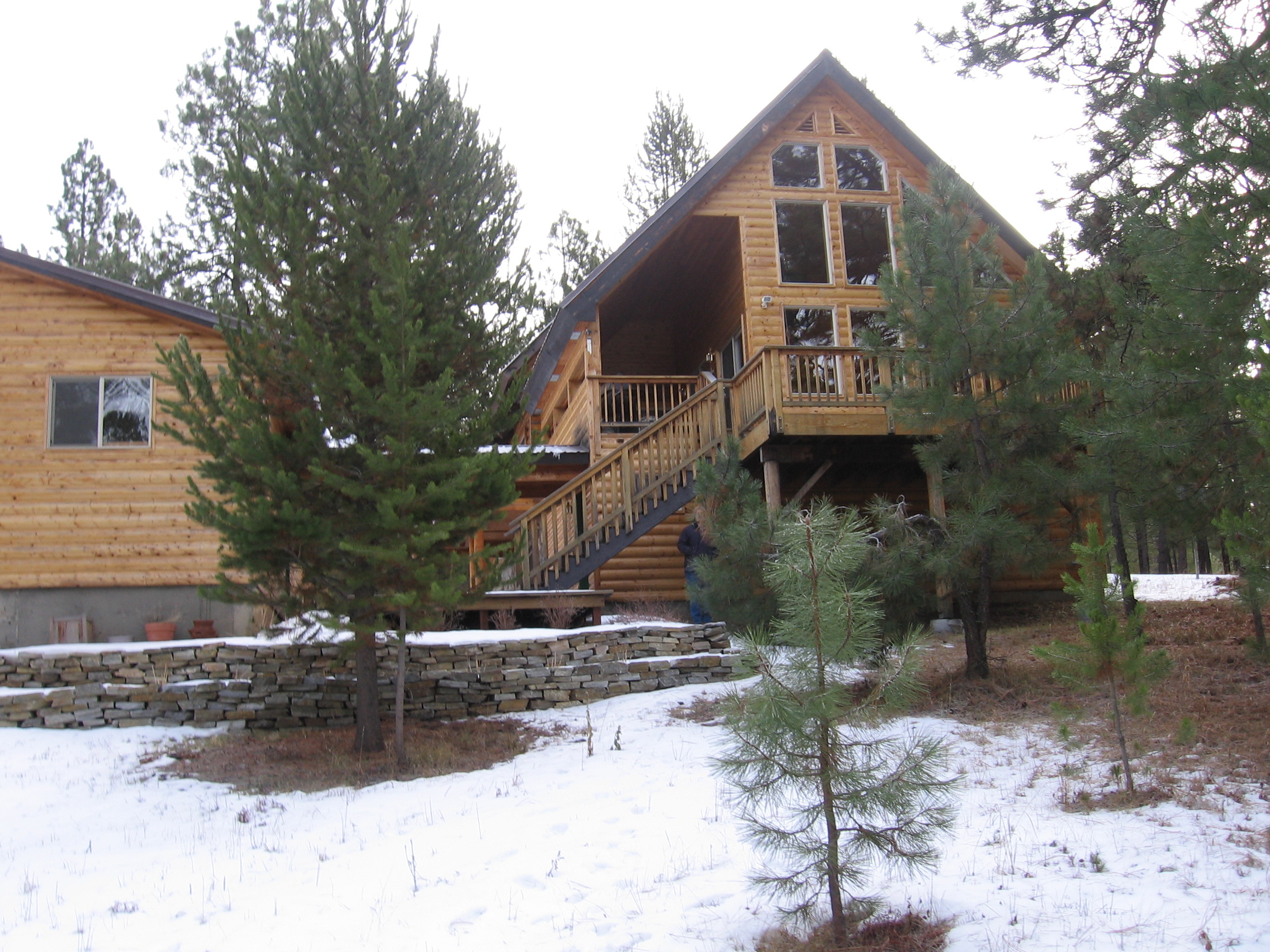 Looking at house from West of house