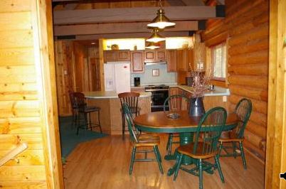 Dining room and kitchen from new sun room on main floor